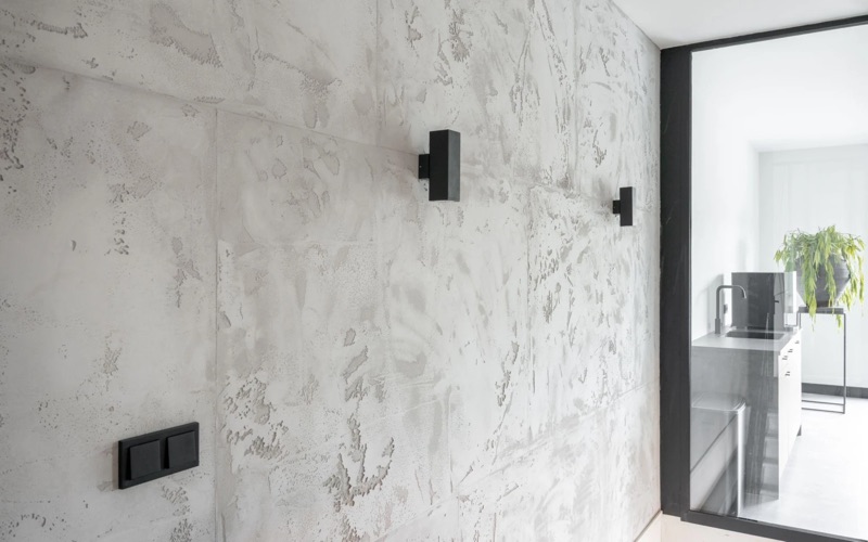 Stone Age Sichtbeton, wand detail met schakelaar